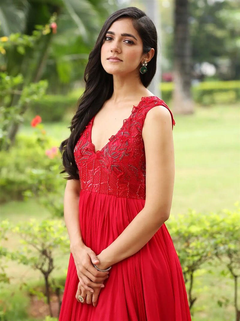 Telugu Actress Simran Choudhary in Red Dress at Atharva Movie Press Meet